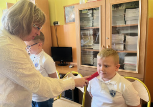 Pasowanie pierwszaków na czytelników